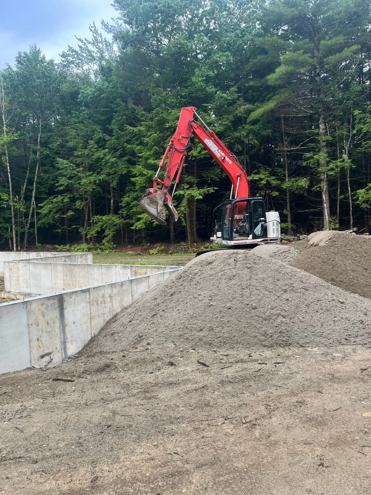 Driveway and drainage work under way.